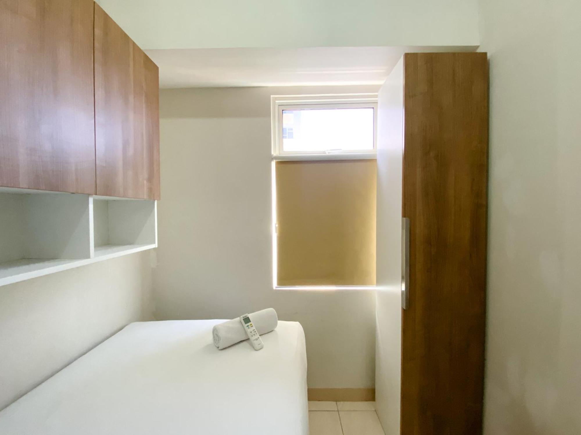 Homey And 3br At Springlake Summarecon By Travelio Apartemen